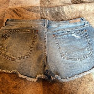 Buckle Black fit 53 shorts. Slightly distressed.